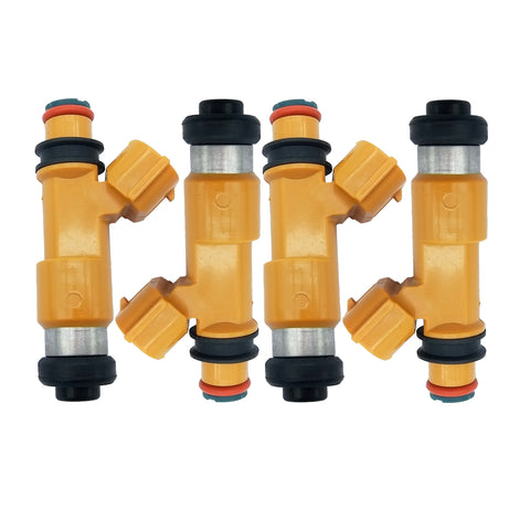 Set of four yellow automotive fuel injectors with black and orange seals isolated on white