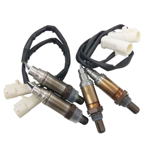 Set of four OEM-quality automotive oxygen sensors with wiring and white connectors for vehicle emission control