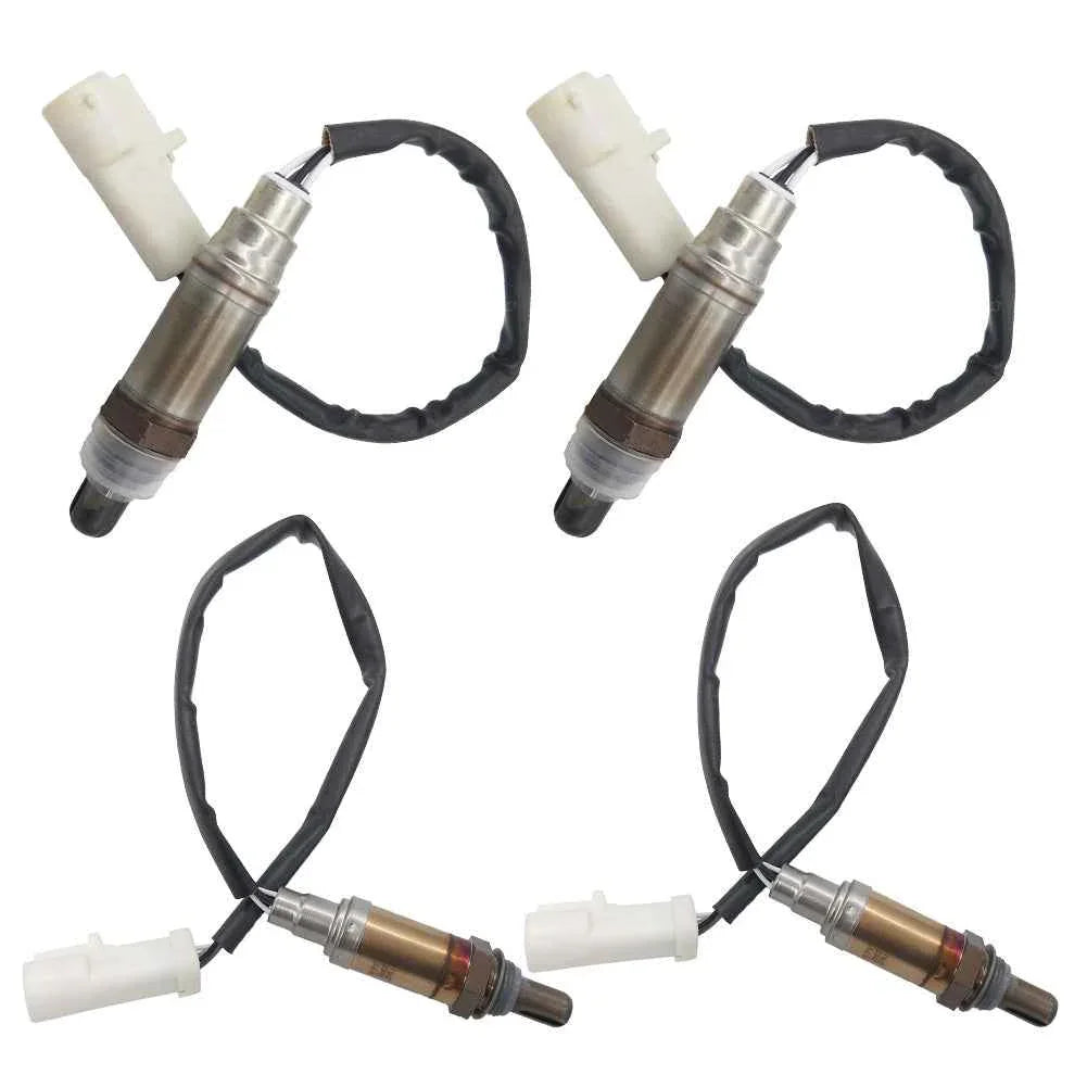Set of four automotive oxygen sensors with metal bodies, black wiring, and white connectors on white background
