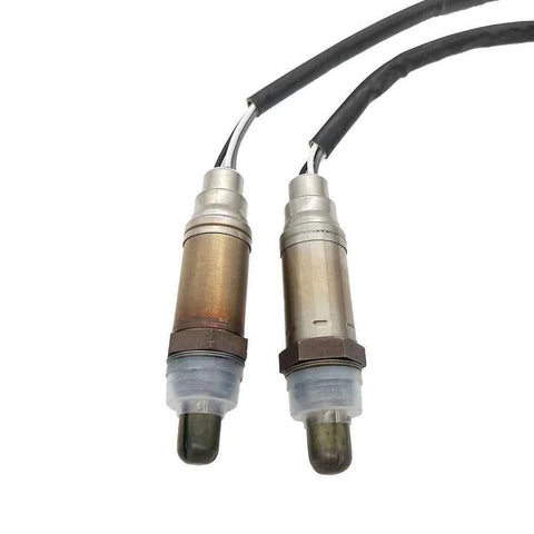 Pair of OEM-quality automotive oxygen sensors with wiring and protective caps on white background