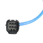 Close-up of black automotive sensor connector with six pins and blue wiring