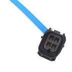 Close-up of blue automotive oxygen sensor connector with black four-pin plug on white background