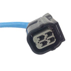 Close-up of a 4-pin automotive electrical connector with a blue wire, used for oxygen sensors or ignition coils