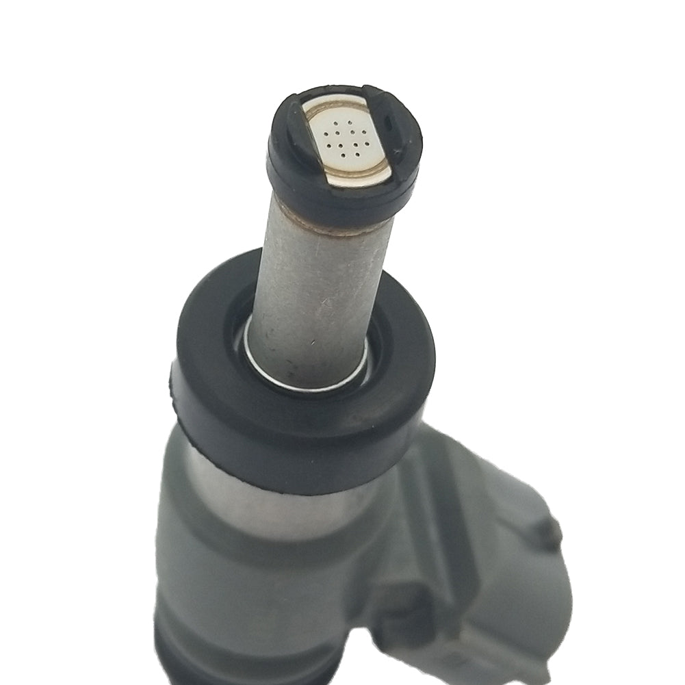 Close-up of automotive fuel injector with metal body and black rubber seals on white background