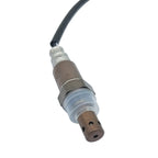 Close-up of an OEM-quality automotive oxygen sensor with metal body and black wire cable
