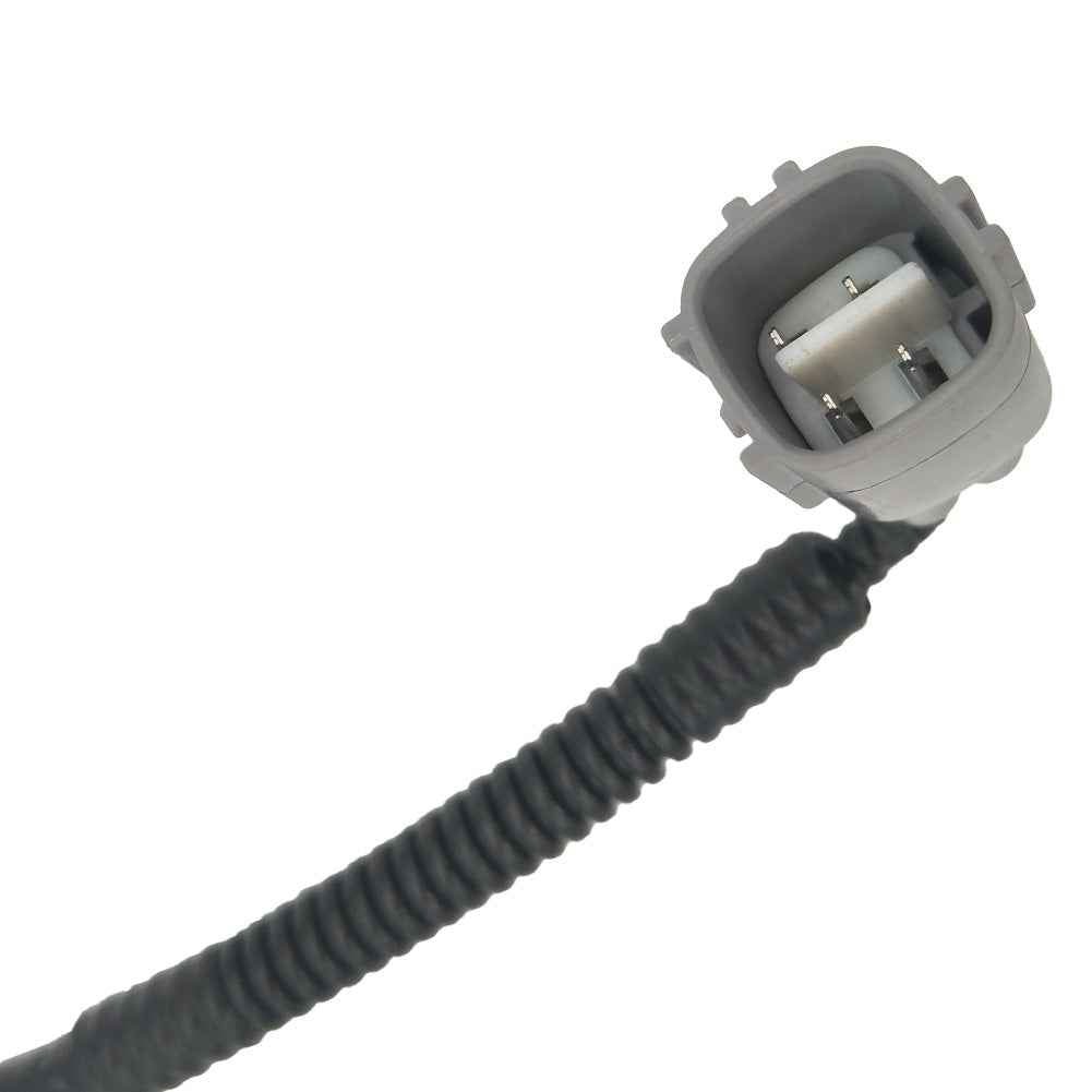 Close-up of gray automotive electrical connector with black corrugated protective sleeve