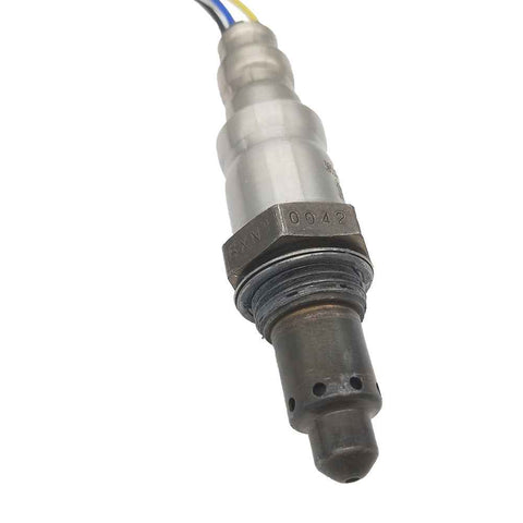 Close-up of OEM oxygen sensor with metal body and wiring for automotive emission control
