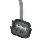 Close-up of a gray automotive electrical connector plug with wiring, OEM quality car part