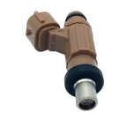 Close-up of brown automotive fuel injector for vehicle engine with metal tip and electrical connector