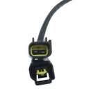 Close-up of two black automotive electrical connectors with yellow seals against white background