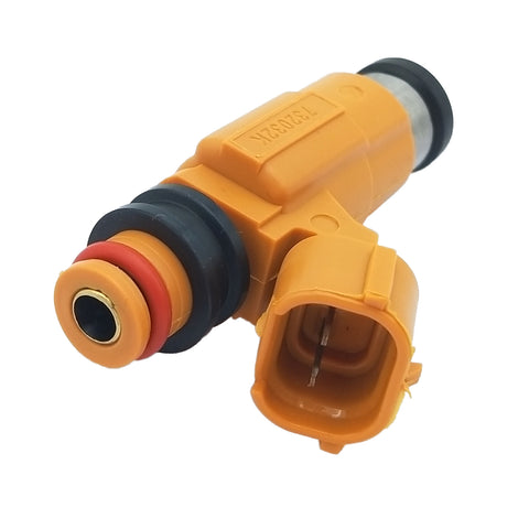 Close-up of orange automotive fuel injector with black and red seals, electrical connector visible