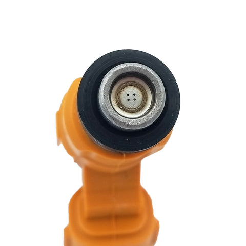 Close-up of automotive orange fuel injector tip with metal and rubber components