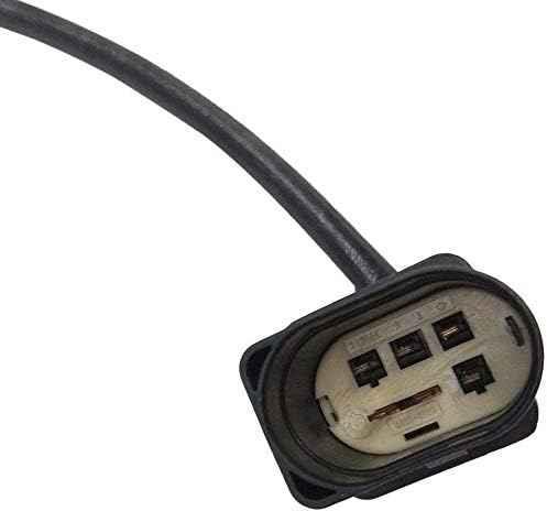 Close-up of a black automotive sensor connector with cable against white background