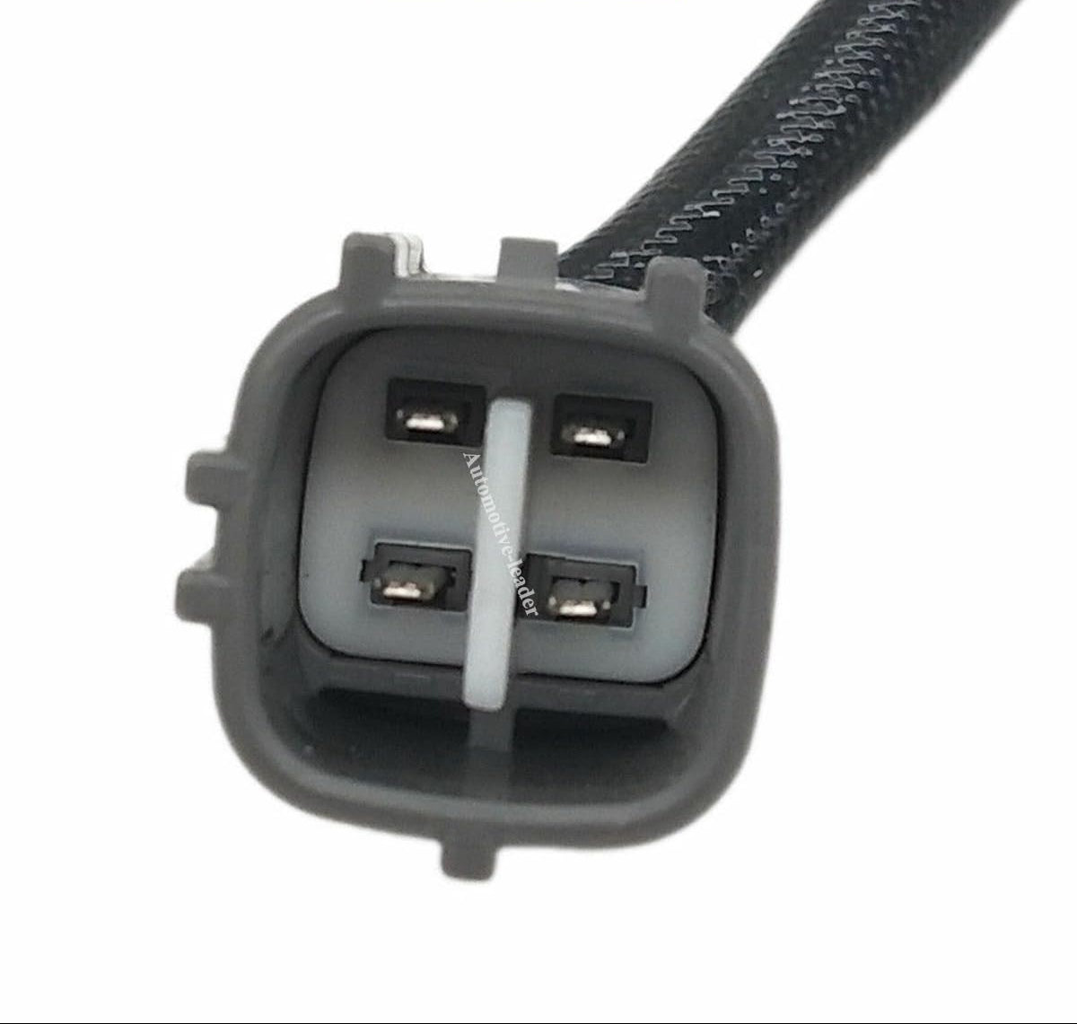 Close-up of a 4-pin automotive electrical connector for vehicle sensors or ignition coils