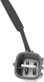 Close-up of a 4-pin automotive electrical connector with black wiring for oxygen sensor or ignition coil