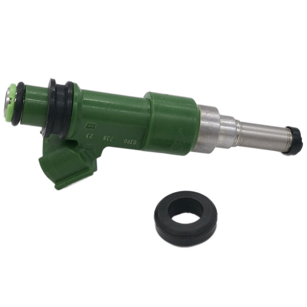 Green automotive fuel injector with rubber seal ring on white background