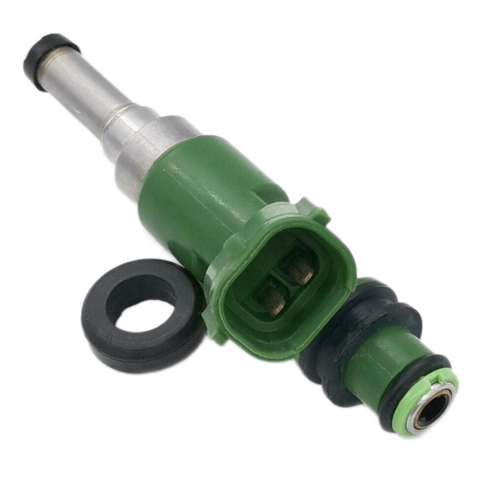 Green automotive fuel injector with rubber seal ring on white background