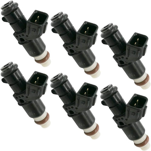 Set of six black automotive fuel injectors with electrical connectors on white background