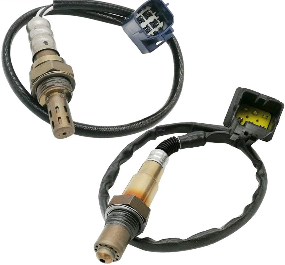 Two automotive oxygen sensors with wiring and connectors on a white background
